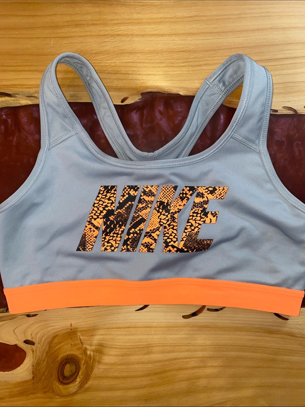 Nike EUC Sports Bra with Orange Snakeskin logo Size M
